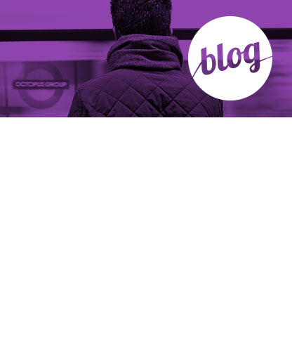 a guy in the underground tube station looking at a sign that has the destination as Octopus group with superimposed text that reads Octopus Group read our latest and greatest. latest blog posts